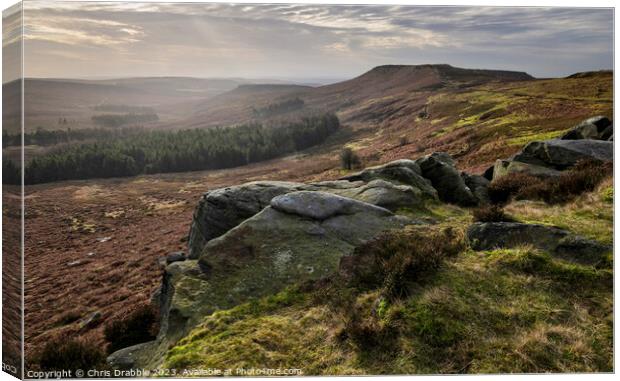 Higger Tor with rain moving through Canvas Print by Chris Drabble