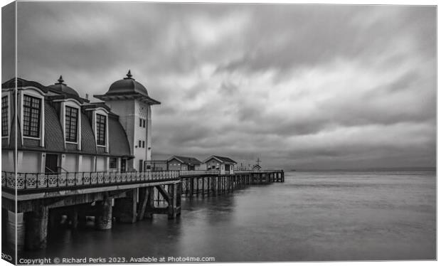 Brooding Skies Over Penarth Pier Canvas Print by Richard Perks