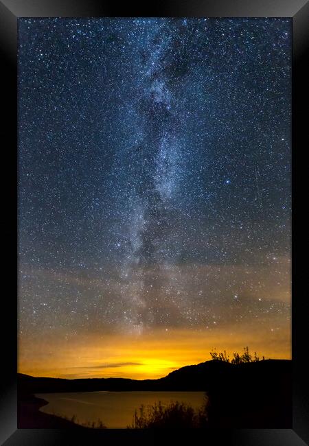 Milky Way Over Clatteringshaws Loch Framed Print by Derek Beattie
