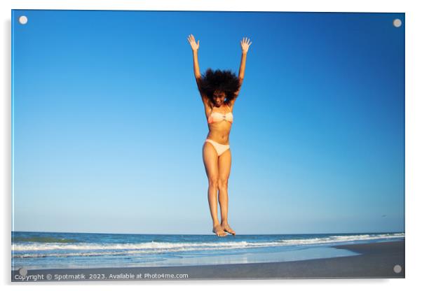 Afro American woman in swimwear jumping for joy Acrylic by Spotmatik 