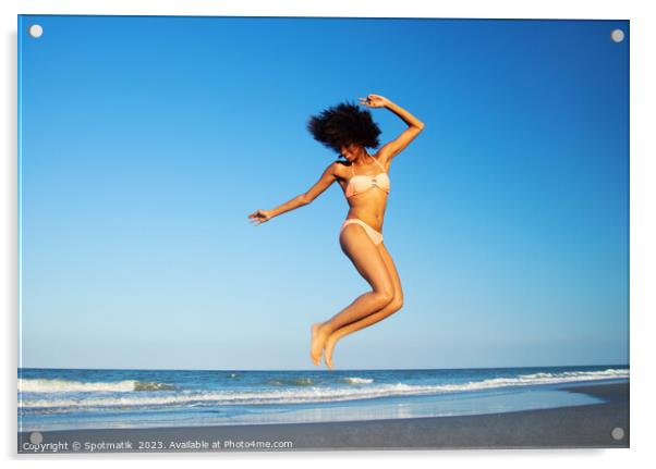 Afro American woman jumping for joy on beach Acrylic by Spotmatik 