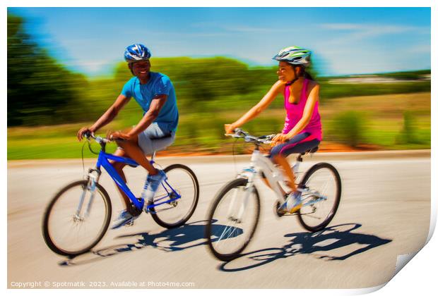 African American couple keeping fit riding bikes together Print by Spotmatik 