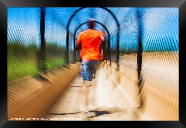 Afro American male jogging outdoors with motion blur Framed Print by Spotmatik 