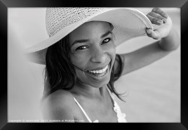 Portrait of smiling African American girl wearing hat Framed Print by Spotmatik 