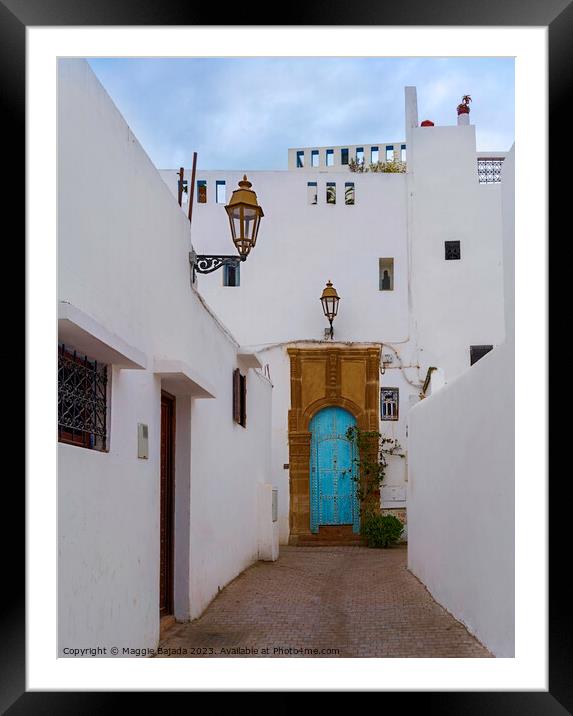 White Building with Blue Door in Rabat, Morocco. Framed Mounted Print by Maggie Bajada