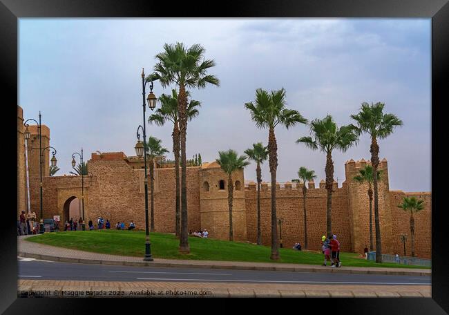 Brown Building with Palm trees of Rabat Citadel in Morocco. Framed Print by Maggie Bajada