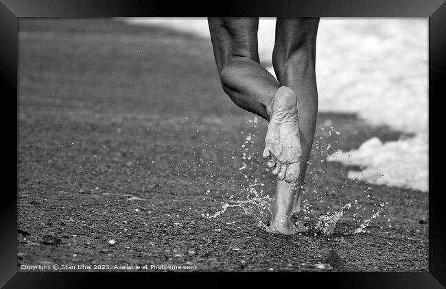 foot of a girl running along the sea surf Framed Print by Stan Lihai