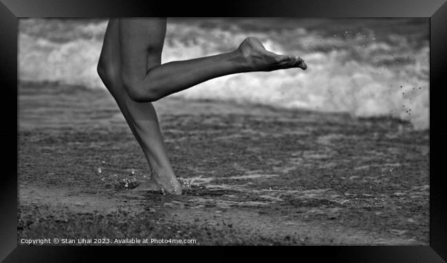 Abstract Legs of a girl running along the sea surf Framed Print by Stan Lihai