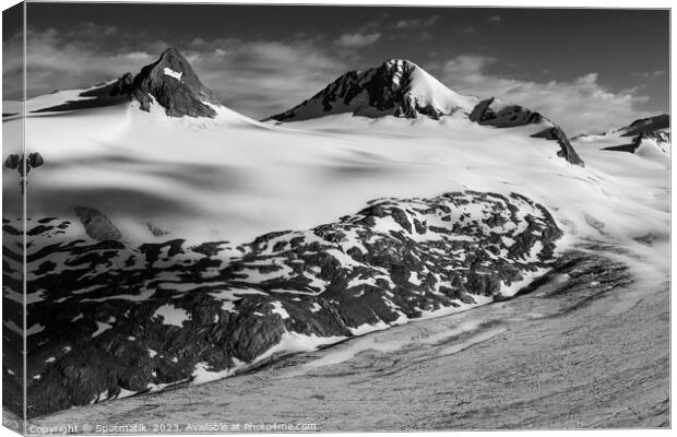 Aerial snowy mountain Wilderness Alaskan remote Chugach mountain Canvas Print by Spotmatik 