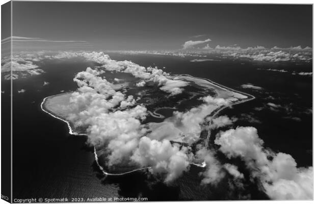 Aerial cloud covered Bora Bora in French Polynesia  Canvas Print by Spotmatik 