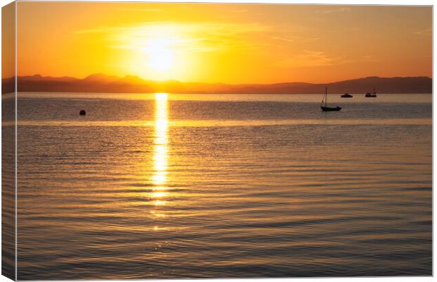 Sunrise over Abersosh Bay Canvas Print by Tim Hill