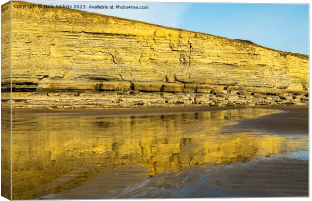 Dunraven Bay Cliffs reflected in the wet sand  Canvas Print by Nick Jenkins