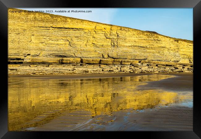 Dunraven Bay Cliffs reflected in the wet sand  Framed Print by Nick Jenkins