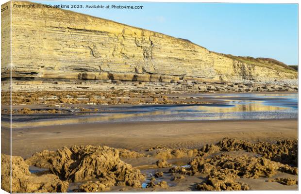 Rocks Sand and Cliffs Dunraven Bay  Canvas Print by Nick Jenkins
