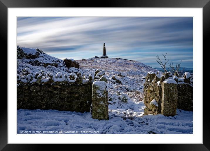 Snow Covered Monument Framed Mounted Print by Mark Bowman