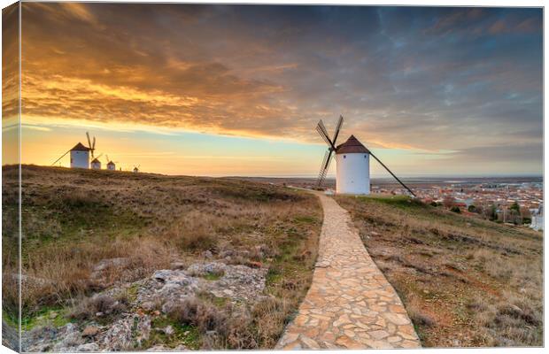 Beautiful sunrise over the Manchegos windmills Canvas Print by Helen Hotson