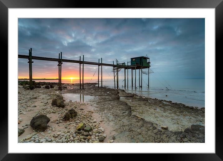 Sunset over fishing carrelets at Marsilly  Framed Mounted Print by Helen Hotson