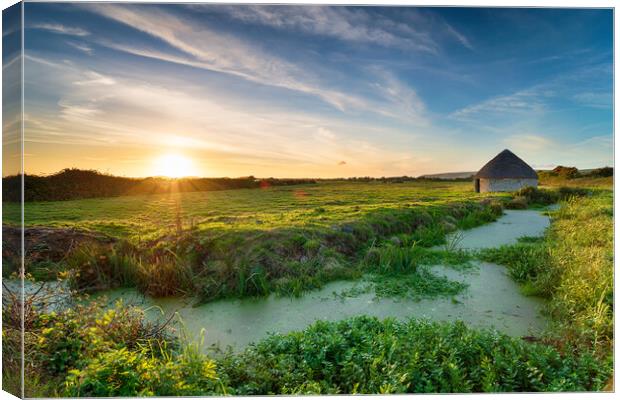 Sunset over Braunton Marshes Canvas Print by Helen Hotson