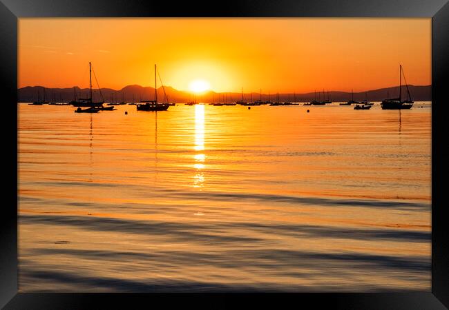 Sunrise happens over Abersoch Bay Framed Print by Tim Hill