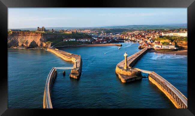 Whitby harbour entrance and piers Framed Print by Tim Hill