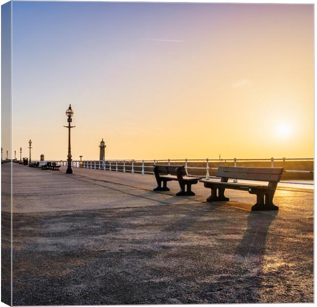 Sunrise over Whitby Pier, North Yorkshire Canvas Print by Tim Hill