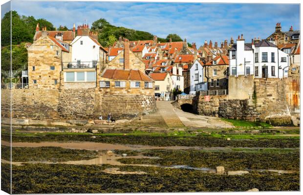 Dog walkers on Robin Hoods Bay beach Canvas Print by Tim Hill