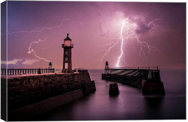 Lightning out to sea from Whitby Pier Canvas Print by Tim Hill
