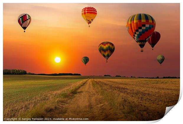 Colorful hot air balloons flying over field at sunset. Print by Sergey Fedoskin