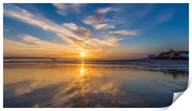 Sunrise reflections at low tide at Tenby in Wales Print by Tim Hill