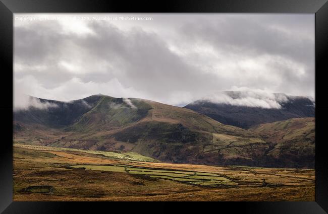 Moody Mountain Range Snowdonia Wales Framed Print by Pearl Bucknall