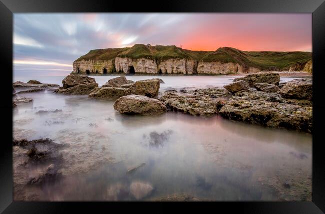 Thornwick Bay Sunrise and Cliff Caves Framed Print by Tim Hill