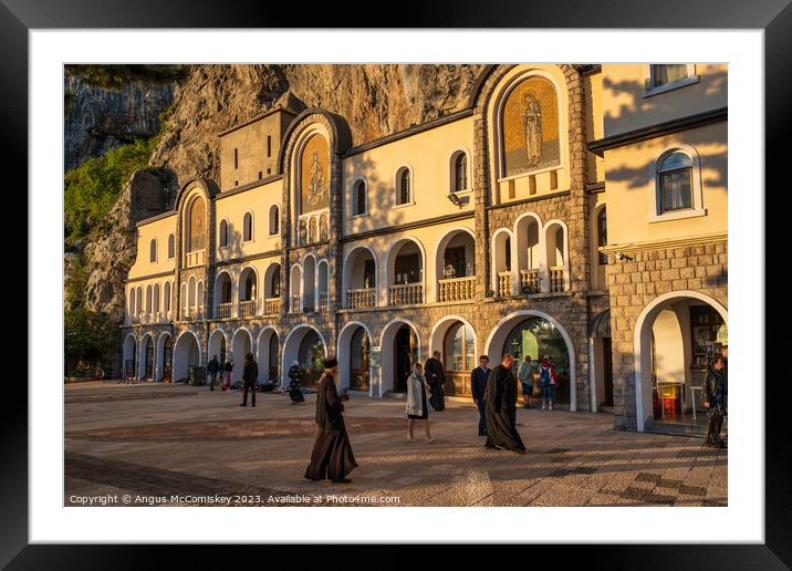 Ostrog Monastery in Montenegro at golden hour Framed Mounted Print by Angus McComiskey
