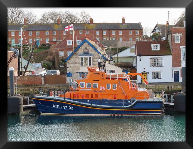Brave Rescuers at Weymouth Lifeboat Station Framed Print by Nicola Clark