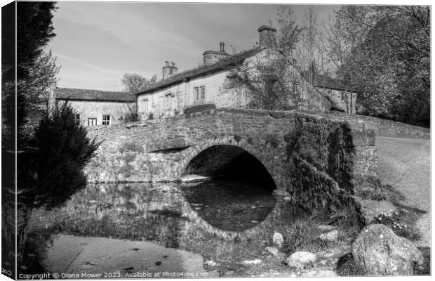  Malham bridge in Black and White Canvas Print by Diana Mower