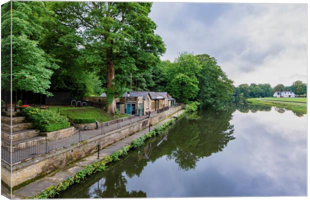 Moody reflections of Saltaire Canvas Print by Tim Hill