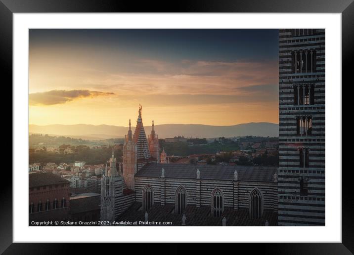 Siena Cathedral side view at sunset. Tuscany, Italy. Framed Mounted Print by Stefano Orazzini