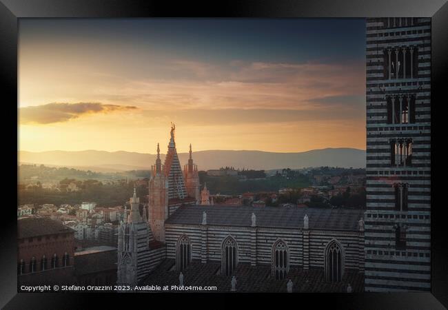 Siena Cathedral side view at sunset. Tuscany, Italy. Framed Print by Stefano Orazzini