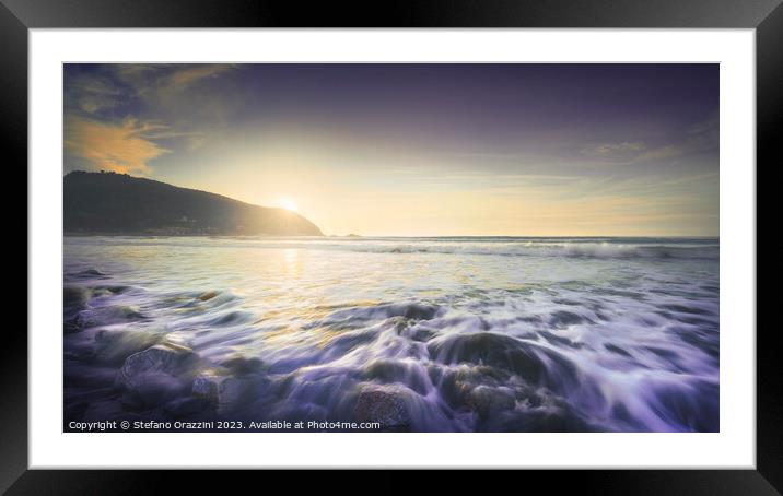 Waves on Baratti beach at sunset. Tuscany, Italy Framed Mounted Print by Stefano Orazzini