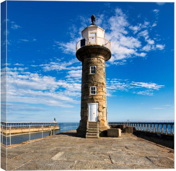 Whitby pier Lighthouse Canvas Print by Tim Hill
