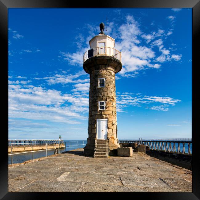 Whitby pier Lighthouse Framed Print by Tim Hill