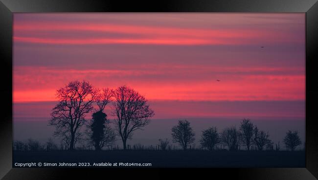 sunrise sky Framed Print by Simon Johnson