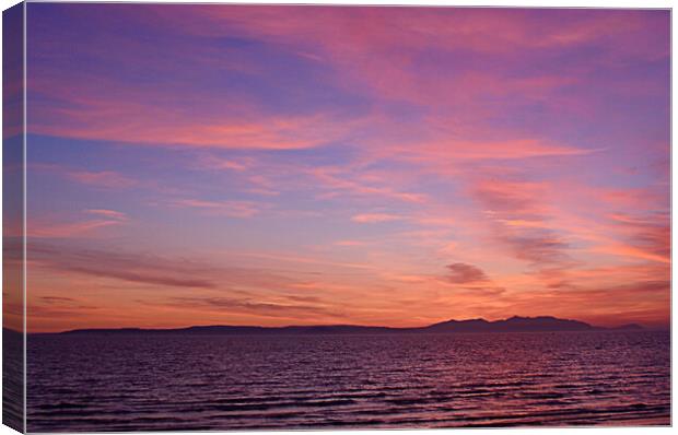 Colourful sky over Arran at sunset Canvas Print by Allan Durward Photography