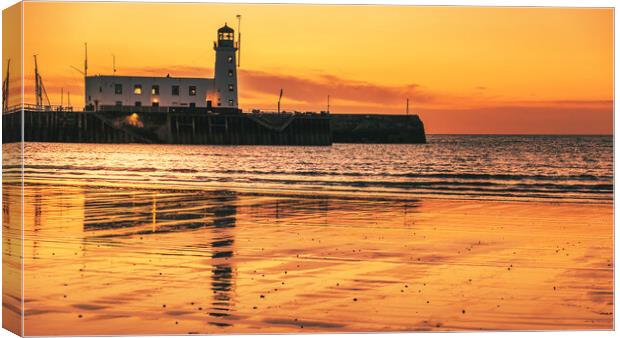 Scarborough Lighthouse Sunrise from South Bay Canvas Print by Tim Hill