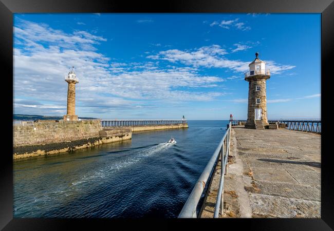 Boat leaves Whitby Harbour Framed Print by Tim Hill