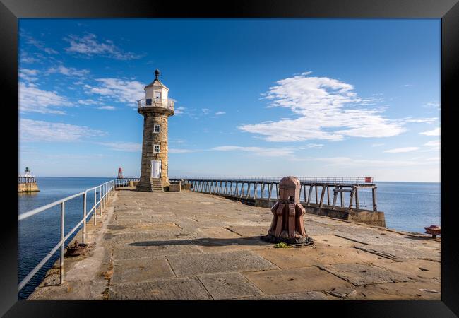 Guiding Light at Whitby Pier Framed Print by Tim Hill