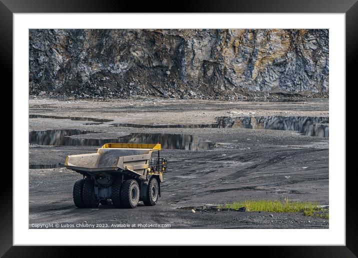 Dump truck in limestone mining, heavy machinery. Mining in the quarry. Framed Mounted Print by Lubos Chlubny