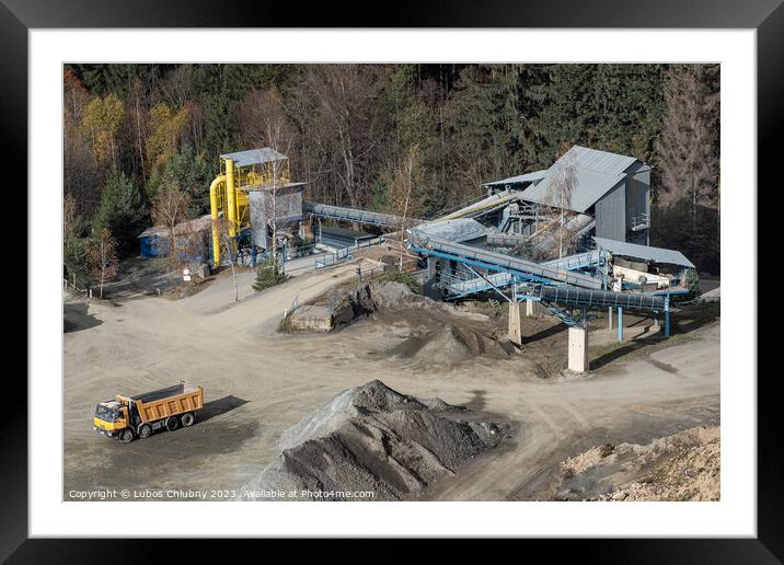 Truck and mining equipment in the quarry. Industrial stone quarrying. Framed Mounted Print by Lubos Chlubny