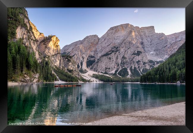 Peaceful alpine lake Braies in Dolomites mountains. Lago di Braies, Italy, Europe. Scenic image of Italian Alps. Framed Print by Lubos Chlubny