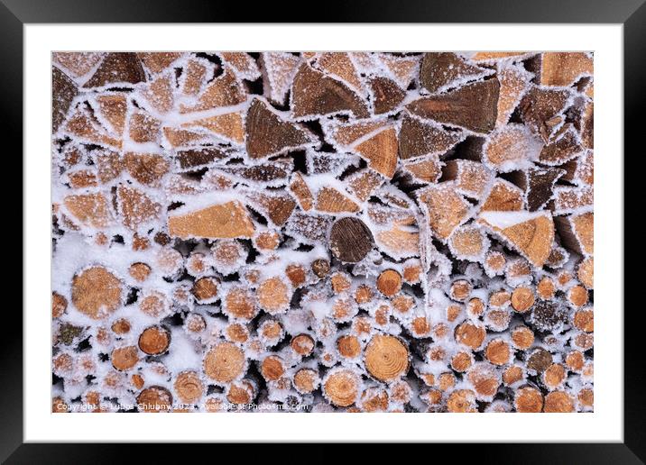 Frost on a pile of firewood Framed Mounted Print by Lubos Chlubny