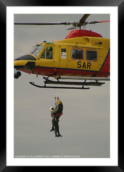 Saving Lives in the Storm Framed Mounted Print by Les Schofield